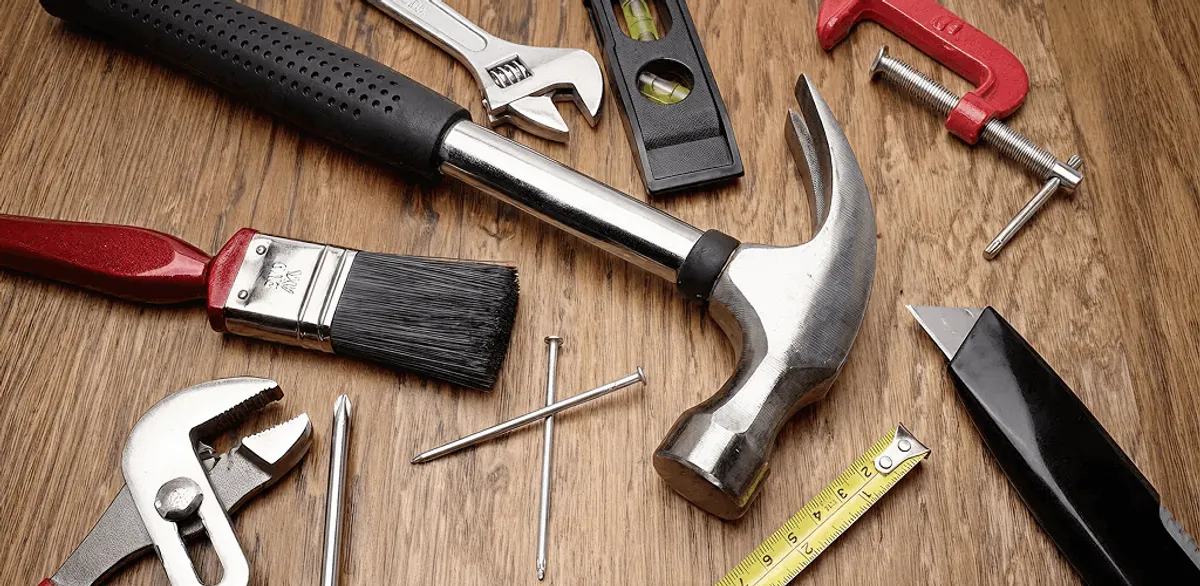 Handyman tools laid out for home repair and maintenance work in Grand Rapids, MI