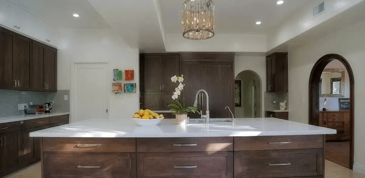 Cabinet refacing project with updated kitchen cabinets and island in Grand Rapids, MI